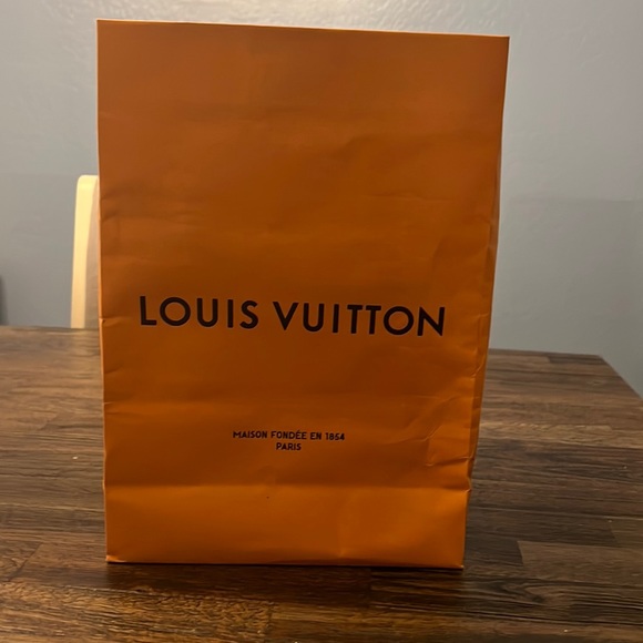 Louis Vuitton scarf bought at the original Louie store in Paris!